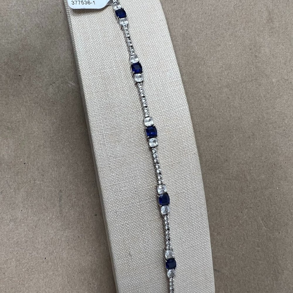 SILVER BRACELET WITH BLUE STONES AND CLEAR STONES